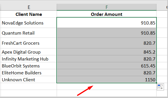 Excel showing XLOOKUP formula results filled down in Order Amount column using drag handle