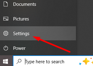 red arrow pointing to Settings option in Windows Start menu
