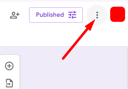 red arrow pointing to three-dot menu icon in Google Forms top-right corner